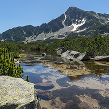 Landscape with Reflection of Sivrya peak in Banski lakes, Pirin Mountain, Bulgaria