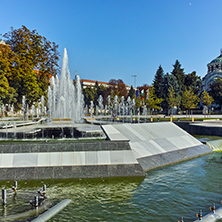 PLEVEN, BULGARIA - 20 SEPTEMBER 2015: Town hall and fountain in center of city of Pleven, Bulgaria