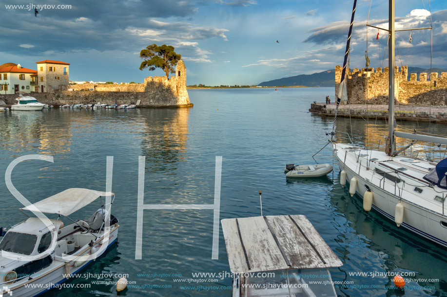 NAFPAKTOS, GREECE - MAY 28, 2015: Sunset panorama of Fortification at the port of Nafpaktos town, Western Greece