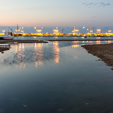 CHERNOMORETS, BULGARIA - AUGUST 14, 2017: Night seascape of port and beach of Chernomorets, Burgas region, Bulgaria