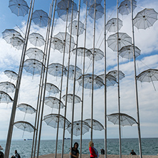 THESSALONIKI, GREECE - SEPTEMBER 30, 2017: People under Umbrellas sculpture in of of city of Thessaloniki, Central Macedonia, Greece