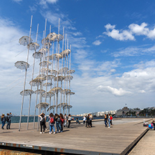 THESSALONIKI, GREECE - SEPTEMBER 30, 2017: People under Umbrellas sculpture in of of city of Thessaloniki, Central Macedonia, Greece