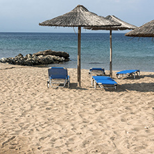 CHALKIDIKI, CENTRAL MACEDONIA, GREECE - AUGUST 25, 2014: Seascape of Blue Dolphin Cove Beach at Sithonia peninsula, Chalkidiki, Central Macedonia, Greece