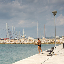 CHALKIDIKI, CENTRAL MACEDONIA, GREECE - AUGUST 25, 2014:  Seascape of port of Nikiti at Sithonia peninsula, Chalkidiki, Central Macedonia, Greece