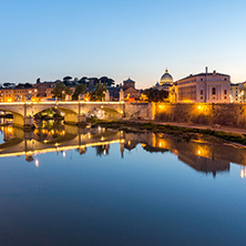 Amazing Sunset view of Tiber River and St. Peter"s Basilica in Rome, Italy