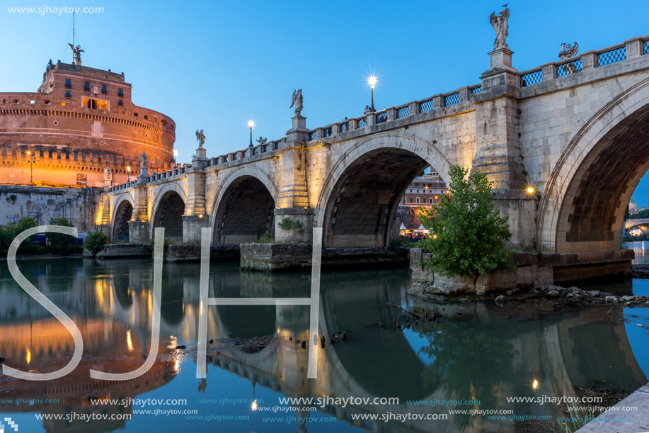 ROME, ITALY - JUNE 22, 2017: Amazing Sunset view of St. Angelo Bridge and castle st. Angelo in city of Rome, Italy