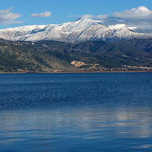 Amazing panoramic Landscape of Lake Pamvotida, Pindus mountain and city of Ioannina, Epirus, Greece