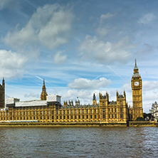 LONDON, ENGLAND - JUNE 19 2016: Cityscape of Westminster Palace, Big Ben and Thames River, London, England, United Kingdom