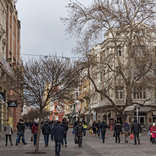 PLOVDIV, BULGARIA - DECEMBER 30, 2016:  Walking people and Houses at central street in city of Plovdiv, Bulgaria