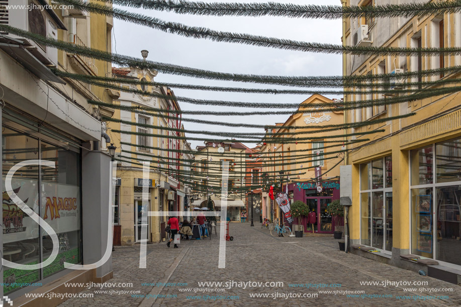 PLOVDIV, BULGARIA - DECEMBER 30, 2016:  Walking people and Street in district Kapana, city of Plovdiv, Bulgaria