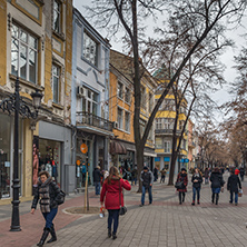 PLOVDIV, BULGARIA - DECEMBER 30, 2016:  Walking people and Houses at central street in city of Plovdiv, Bulgaria