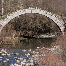 Amazing landscape of Bridge of Kontodimos or Lazaridis in Vikos gorge and Pindus Mountains, Zagori, Epirus, Greece