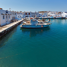 PAROS, GREECE - MAY 3, 2013: Boats at the port of Naoussa town, Paros island, Cyclades, Greece