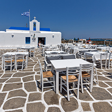 PAROS, GREECE - MAY 3, 2013: Old white house and Bay in Naoussa town, Paros island, Cyclades, Greece