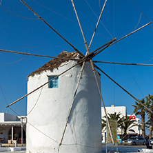 NAXOS, GREECE - MAY 4, 2013: White windmill at Naxos Island, Cyclades, Greece