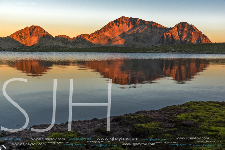 Sunset landscape with Kamenitsa peak and Tevno lake, Pirin Mountain, Bulgaria