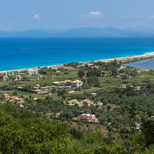Panoramic view of Agios Ioanis beach with blue waters, Lefkada, Ionian Islands, Greece