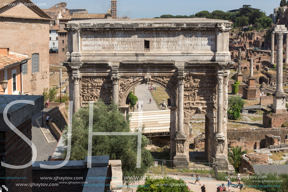 ROME, ITALY - JUNE 23, 2017: Ruins of Septimius Severus Arch and Roman Forum in city of Rome, Italy