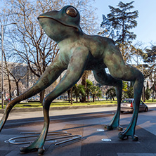 MADRID, SPAIN - JANUARY 21, 2018: Statue of a frog and Cera Museum at Paseo de la Castellana street in City of Madrid, Spain