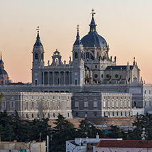 MADRID, SPAIN - JANUARY 21, 2018:  Sunset view of Royal Palace and Almudena Cathedral in City of Madrid, Spain