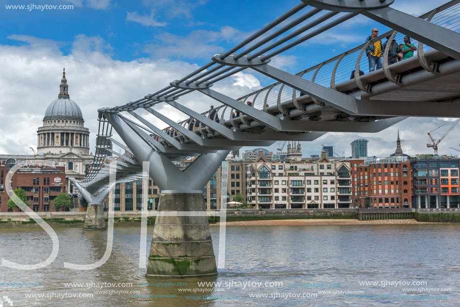 LONDON, ENGLAND - JUNE 15 2016:  St. Paul"s Cathedral and Millennium bridge, London, England, Great Britain