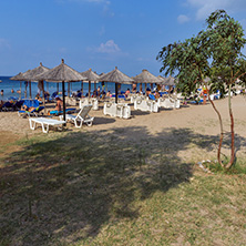 CHALKIDIKI, CENTRAL MACEDONIA, GREECE - AUGUST 25, 2014: Seascape of Blue Dolphin Cove Beach at Sithonia peninsula, Chalkidiki, Central Macedonia, Greece