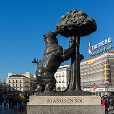MADRID, SPAIN - JANUARY 22, 2018:  Statue of the Bear and the Strawberry Tree at Puerta del Sol in Madrid, Spain