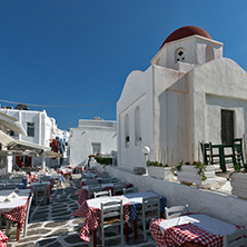 MYKONOS, GREECE - MAY 1, 2013: White orthodox church and small bell tower in Mykonos, Cyclades Islands, Greece