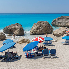 MEGALI PETRA BEACH, LEFKADA, GREECE - JULY 16, 2014: Panoramic view of blue waters of Megali Petra Beach, Lefkada, Ionian Islands, Greece