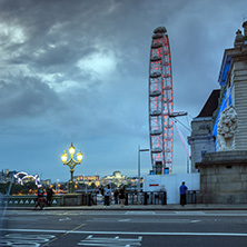 LONDON, ENGLAND - JUNE 16 2016: Night photo of The London Eye and County Hall from Westminster bridge, London, England, Great Britain