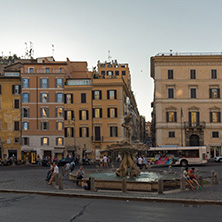 ROME, ITALY - JUNE 24, 2017: Yellow Sunset at Triton Fountain at Piazza Barberini in Rome, Italy