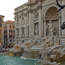 ROME, ITALY - JUNE 24, 2017: Sunset view of Tourist visiting Trevi Fountain (Fontana di Trevi) in city of Rome, Italy