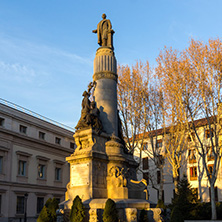 MADRID, SPAIN - JANUARY 22, 2018: Sunset view of Monument of Francisco Romero Robledo and Senate in City of Madrid, Spain