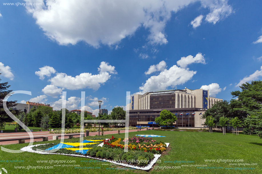 SOFIA, BULGARIA -MAY 20, 2018:  Flower garden and National Palace of Culture in Sofia, Bulgaria