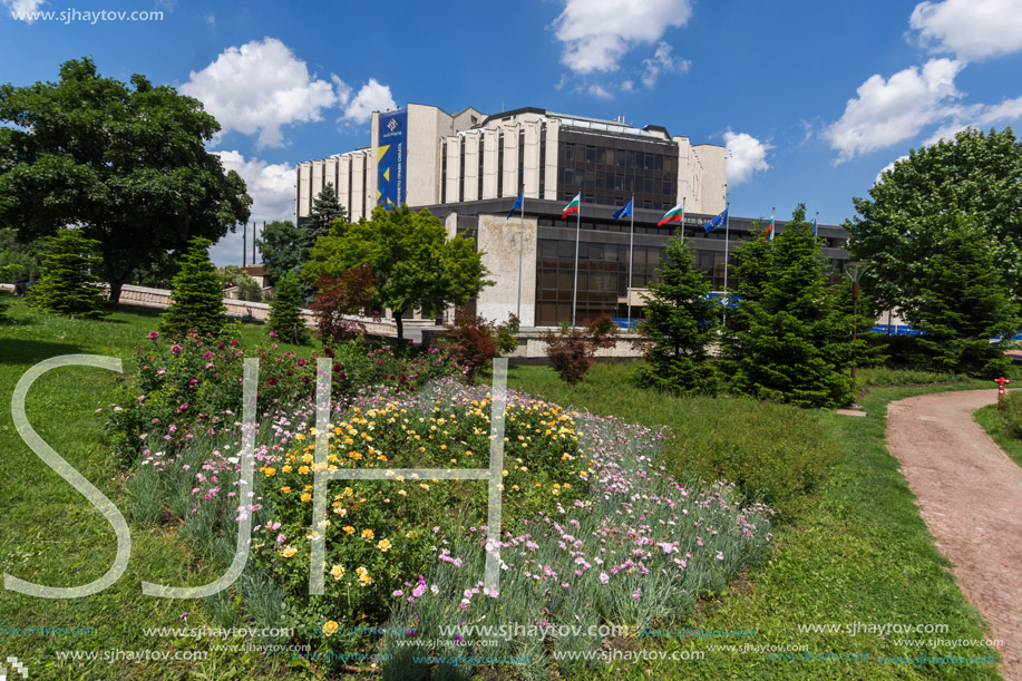 SOFIA, BULGARIA -MAY 20, 2018:  Flower garden and National Palace of Culture in Sofia, Bulgaria