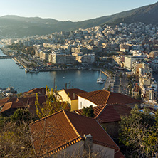 KAVALA, GREECE - DECEMBER 27, 2015: Sunset view of Ruins of fortress and Panorama to Kavala, East Macedonia and Thrace, Greece