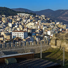 KAVALA, GREECE - DECEMBER 27, 2015: Sunset view of Ruins of fortress and Panorama to Kavala, East Macedonia and Thrace, Greece