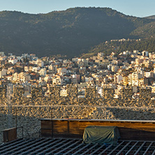 KAVALA, GREECE - DECEMBER 27, 2015: Sunset view of Ruins of fortress and Panorama to Kavala, East Macedonia and Thrace, Greece