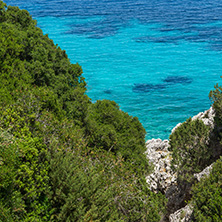 Small beach with blue waters in Kefalonia, Ionian Islands, Greece