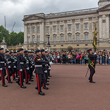 LONDON, ENGLAND - JUNE 17, 2016: British Royal guards perform the Changing of the Guard in Buckingham Palace, London, England, Great Britain