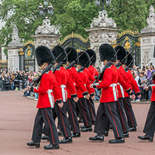 LONDON, ENGLAND - JUNE 17, 2016: British Royal guards perform the Changing of the Guard in Buckingham Palace, London, England, Great Britain