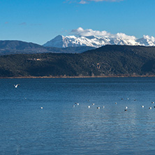 Amazing winter Landscape of Lake Pamvotida and Pindus mountain from city of Ioannina, Epirus, Greece