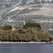 Amazing winter Landscape of Lake Pamvotida and Pindus mountain from city of Ioannina, Epirus, Greece