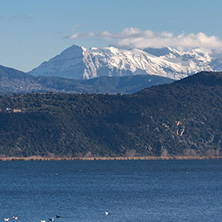 Amazing winter Landscape of Lake Pamvotida and Pindus mountain from city of Ioannina, Epirus, Greece