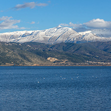 Amazing winter Landscape of Lake Pamvotida and Pindus mountain from city of Ioannina, Epirus, Greece