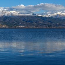 Amazing winter Landscape of Lake Pamvotida and Pindus mountain from city of Ioannina, Epirus, Greece