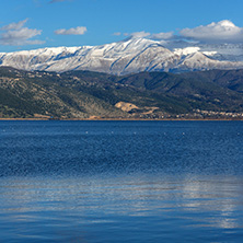 Amazing winter Landscape of Lake Pamvotida and Pindus mountain from city of Ioannina, Epirus, Greece