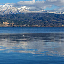 Amazing winter Landscape of Lake Pamvotida and Pindus mountain from city of Ioannina, Epirus, Greece