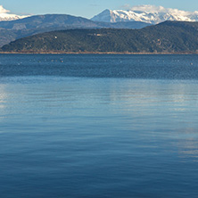 Amazing winter Landscape of Lake Pamvotida and Pindus mountain from city of Ioannina, Epirus, Greece