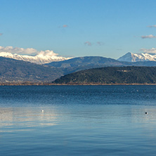 Amazing winter Landscape of Lake Pamvotida and Pindus mountain from city of Ioannina, Epirus, Greece